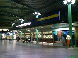 View of Schiphol Plaza with train ticket machines